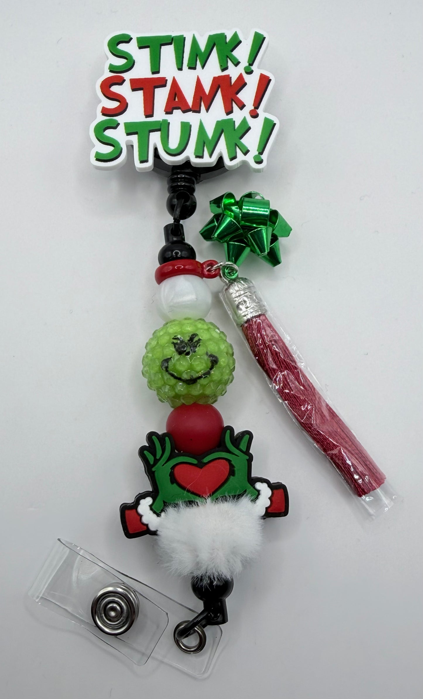 Stunk! Stank! Stunk! Badge Reel