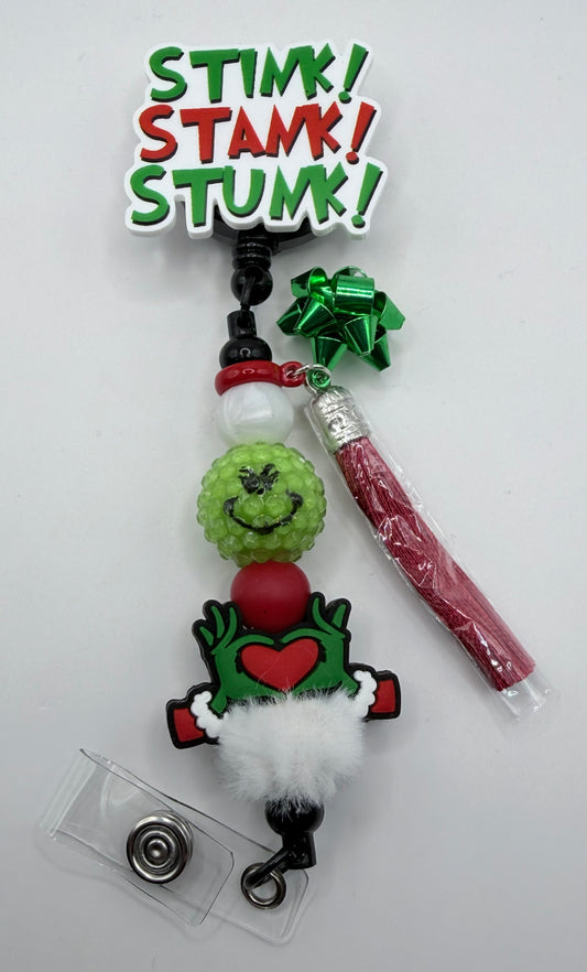 Stunk! Stank! Stunk! Badge Reel