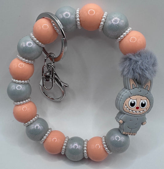 Gray Labubu lookalike Wristlet