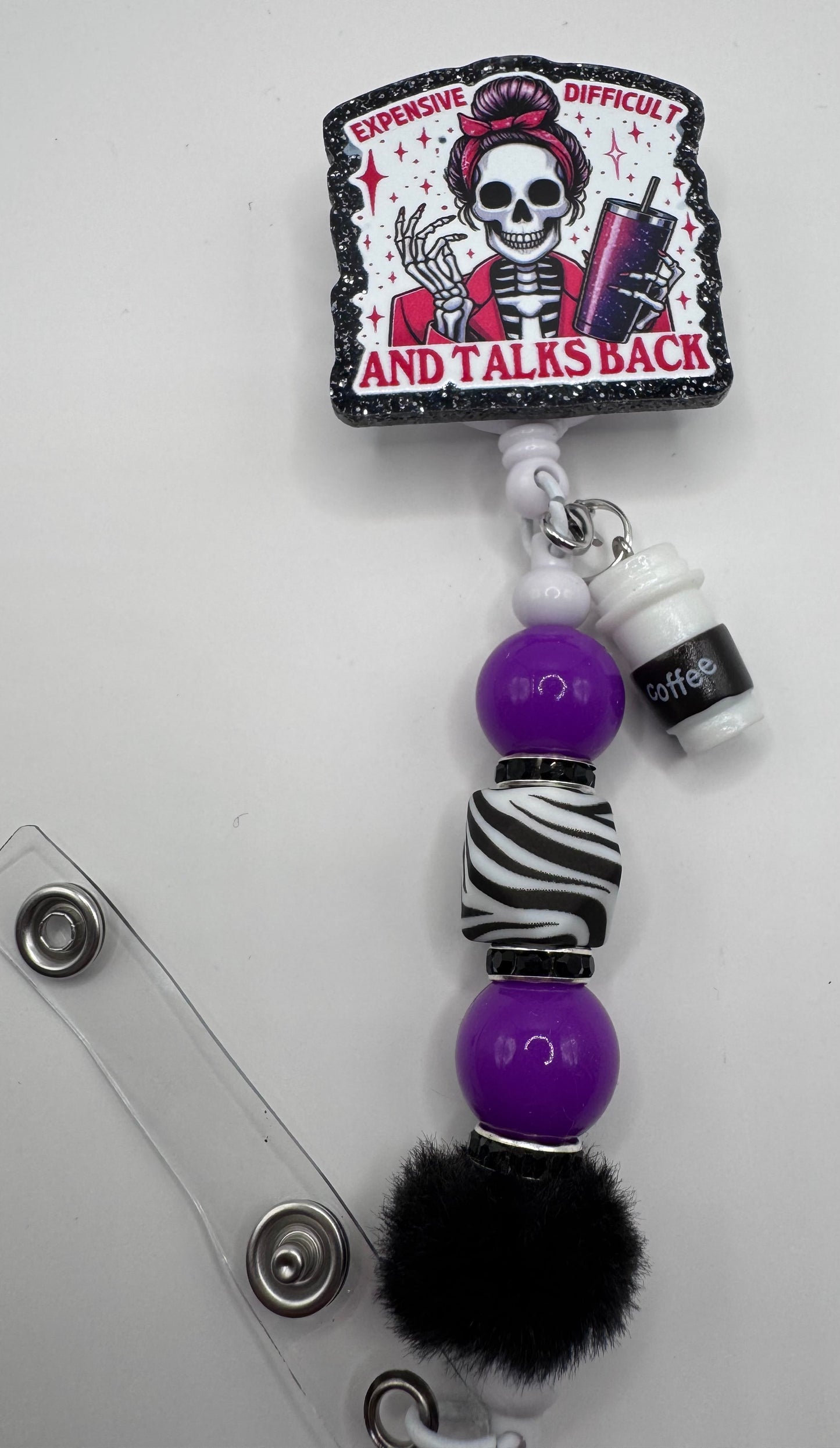 Talks Back Badge Reel